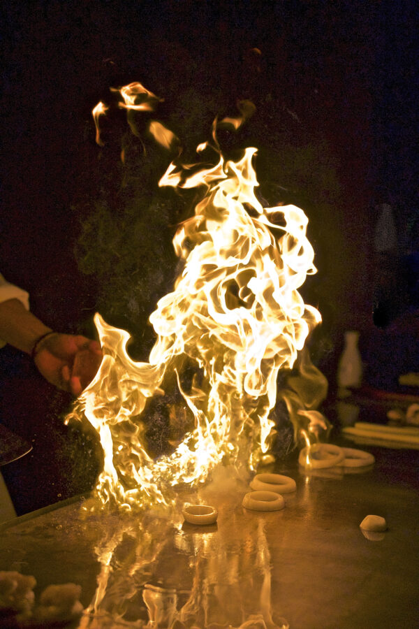 Teppanyaki Hibachi grilling with flames